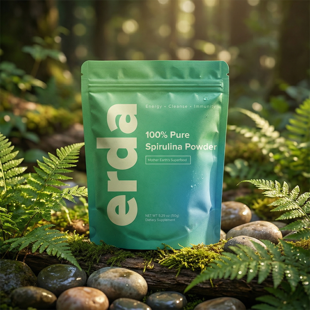 Green package of erda 100% Pure Spirulina Powder surrounded by ferns and stones